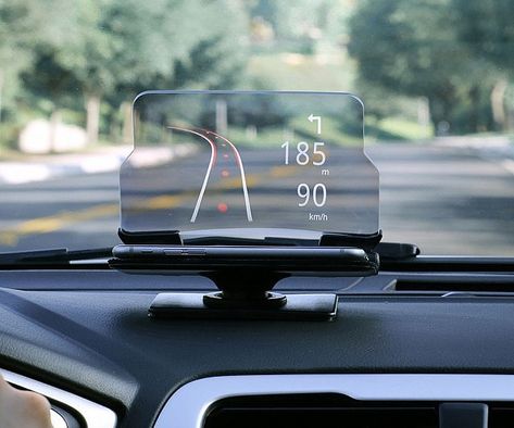 Improve your driving experience by ushering your vehicle into the digital age with the smartphone heads up display system. This revolutionary accessory fits discreetly on the dashboard and works with almost any smartphone to provide real time driving information. Laptop Deals, Retro Gadgets, New Technology Gadgets, Gadgets Technology Awesome, Best Smartphone, Best Cell Phone, Head Up Display, External Battery, Ipad 4