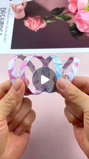 paper crafts creator on Instagram: "Title: "Bestie Bracelet: Handmade DIY for Friendship Fun!"
Hashtags: #HandmadeDIY #FriendshipBracelet #CraftingTutorial #QuickLearning #PaperFoldingTutorial" Paper Friendship Band, How To Make Paper Bracelets, How To Make Friendship Band, Friendship Bands Diy, Handmade Friendship Band, Friendship Bands, Friendship Band, Paper Bracelet, Paper Folding Crafts