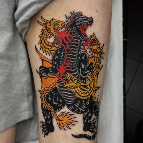 Godzilla having a ruckus with his old mate King Ghidorah on the back of Jacks huge thigh. lukejinks@gmail.com for bookings. Cheers! Godzilla And Mothra Tattoo, Traditional Godzilla Tattoo, Godzilla Tattoo Traditional, King Ghidorah Tattoo, Godzilla Tattoo Ideas, Ghidorah Tattoo, Gojira Tattoo, Kaiju Tattoo, Godzilla Tattoo Design