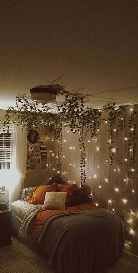 A room with vines hanging from the ceiling String Lights With Leaves, Vines In Bedroom High Ceiling, String Lights Reading Nook, Hanging Veins Bedroom, Vines Across Ceiling, Leafs On Ceiling Aesthetic, Ascetic Bedroom Ideas, Ivy Over Bed, Room Decor Ivy Vines