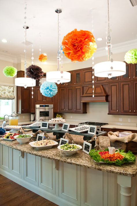 9 Kitchen Island Ideas to Make Your Next Party Perfect | Synchrony Essen, Food Set Up On Kitchen Island, How To Elevate Food On Table, Decorating Food Table For Party, Kitchen Island Food Display, Kitchen Island Party Set Up, Thanksgiving Food Display, Food Set Up For Party, Shelf Covering
