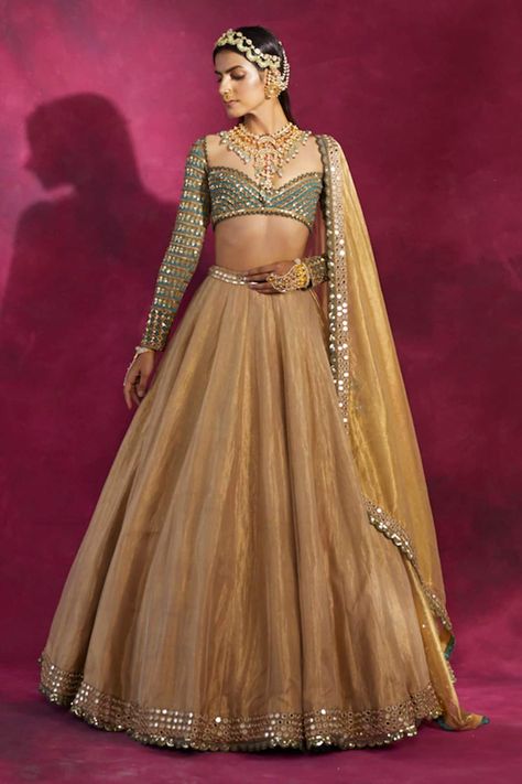 Buy Gold Blouse: Georgette; Lehenga And Dupatta: Tissue Embroidered Set For Women by Vvani by Vani Vats Online at Aza Fashions. Golden Lehenga Bridesmaid, Golden Lehenga Color Combos, Trending Lehnga Designs, Gold Lehenga Simple, Golden Lehenga Simple, Full Sleeve Blouse Designs For Lehnga, Gold Tissue Lehenga, Golden Lehnga, Tissue Lehenga