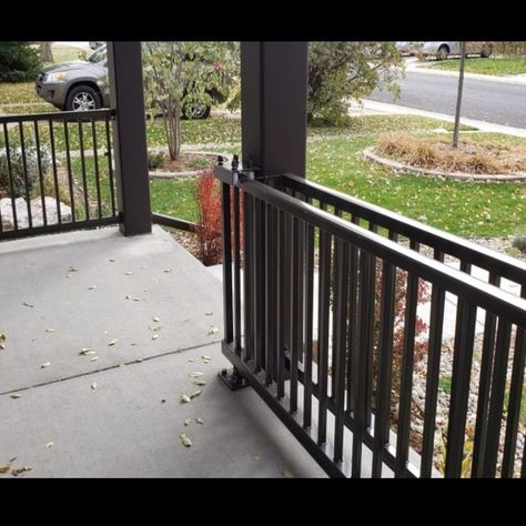 Gates For Front Porch, Front Porch Sliding Gate, Gated Porch Ideas, Front Porch Gate Ideas For Dogs, Porch Railing With Gate, Porch Fence Ideas Dogs, Front Door Dog Gate, Metal Front Porch Railing, Porch Gates For Dogs