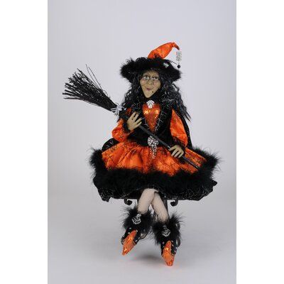 Our Lady Halloween Witch is a luxurious addition to any Halloween display. The quality is unmatched with this decorative piece’s superior glitzed attire, and ornate accessories. With her unique appearance, festive embellishments, and classic design; this piece is sure to add character and style to any home. | Karen Didion Originals Lady Halloween Witch Plastic in Black, Size 30.0 H x 8.0 W x 8.0 D in | Wayfair Halloween Witches, Figurine, Halloween Witch Dolls, Witch Figurines, Mark Roberts, Bethany Lowe, Witch Doll, Pumpkin Lights, Halloween Displays