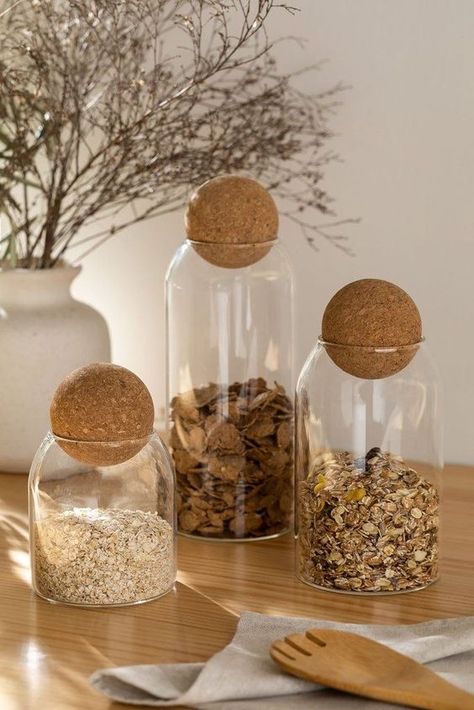 This Set of 4 Sleek Pantry Jars offers a stylish and practical way to keep your pantry organized. Made with high-quality glass and airtight lids, these jars are perfect for storing dry goods. Their modern design adds a touch of elegance to your kitchen décor, while their transparent glass body allows you to quickly identify the contents. Simplify your pantry organization with this stylish Set of 4 Jars. Glass Jar Storage, Pantry Jars, Pantry Containers, Sugar Storage, Gardening Design, Brown Kitchens, Jar Storage, Glass Storage Jars, Kitchen Benches