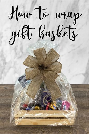 Gift Baskets Wrapping Ideas, How To Clear Wrap A Gift Basket, How To Make A Bow For A Gift Basket, Christmas Basket Wrapping Ideas, Wrapping A Basket Gift, How To Wrap Baskets Gift, Basket Gift Wrapping Ideas, Christmas Gift Basket Wrapping Ideas, How To Wrap A Basket With Cellophane