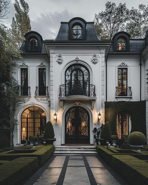 Step into the elegance of our modern French mansion – a canvas of chic luxury with black arches, cozy lighting, and mansioncore allure.… | Instagram Gothic Tudor House, Modern French Mansion, Rich Houses, Boston Homes, French Mansion, Fasad Design, Neoclassical House, Mansion Exterior, Town Houses