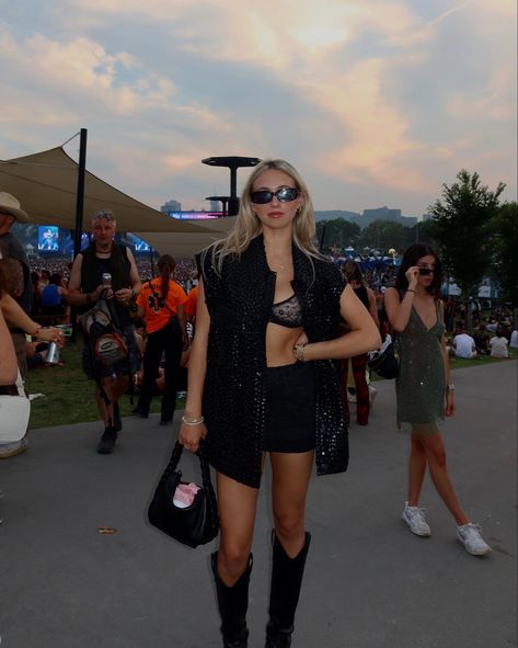 All black festival outfit
Black mini skirt
Black bra top 
Black vest  cowgirl boots Edgy Coachella Outfit, Afterlife Festival Outfit, Rockstar Festival Outfit, All Black Outfit Festival, Raye Concert Outfit, Dj Show Outfit, Street Style Festival Outfit, Alt Music Festival Outfit, Coachella Black Outfit