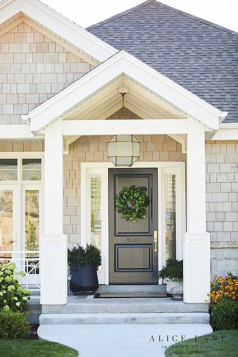 Suzanne Kasler Morris Lantern fitted above a black front door in a covered porch with a black border doormat and styled potted plants. House Front Porch, Porch Remodel, Farmhouse Front Door, Metal House Numbers, Front Porch Design, Cottage Exterior, Casa Exterior, Farmhouse Front, Interior Design Photos
