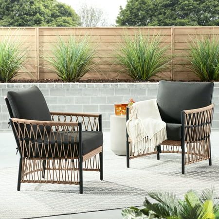 Porches, balconies, gazebos, and more can become a place to sit back and chat with the Better Homes & Gardens Lilah 2-Pack Outdoor Wicker Lounge Chair. Polyester cushions bring plush comfort to patios, decks, and other outdoor spaces. The stainless-steel frames have been powder coated for rust resistance against the elements so the wicker chairs will last season after season. Better Homes & Gardens Lilah Outdoor Wicker Lounge Chairs can transform an outdoor space into an intimate living area for two. Color: Black. Front Porch Chairs, Black Patio Furniture, Small Patio Spaces, Diy Outdoor Space, Wicker Lounge Chair, Small Outdoor Patios, Porch Chairs, Diy Patio Decor, Dream Patio
