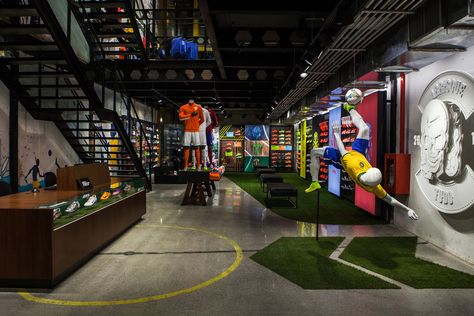 Nike Opens First Football-Only Store in Brasil Sport Store Design, Brazil Copacabana, Distressed Brick, Nike Retail, Sportswear Store, Official Shoes, Soccer Store, Retail Interior Design, Retail Inspiration