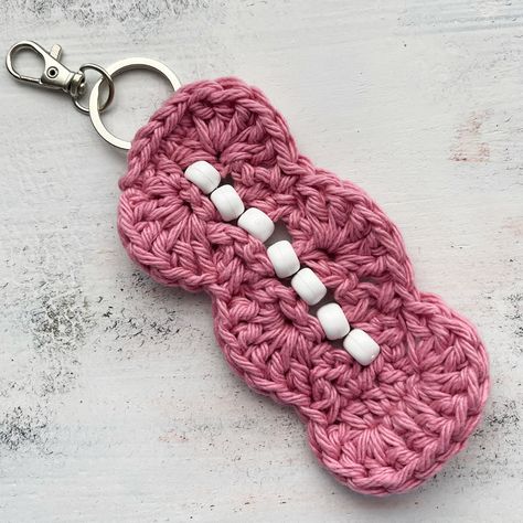 Fidget Keychain with Beads. Learn how to make a fidget keychain with beads with this free crochet pattern and tutorial from Hooked for Life Publishing. How to Make a Fidget Keychain with Beads Crocheters, if you've been looking for something to … Amigurumi Patterns, Fidget Keychain Crochet, Crochet Beaded Keychain Pattern, Crochet Fidget Keychain Pattern, Free Crochet Fidget Toy Patterns, Crochet Fidget Keychain Free Pattern, Crochet Fidget Toys Pattern, Free Crochet Fidget Pattern, Crocheted Fidget Toys