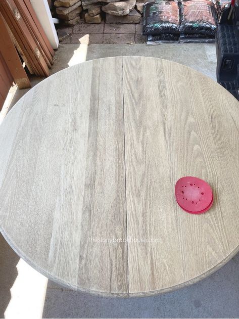 Cowhide Rug Under Round Dining Table, Antique White Wood Stain Table, Refinishing Round Kitchen Table, Pedestal Table Redo, Distressed Round Dining Table, Oak Table With White Chairs, White Stained Table, Oak Table Redo, Round Table And Chairs Makeover