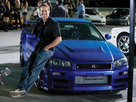 Paul Walker's 'Fast and Furious' Nissan Skyline R34 GT-R Goes Up for Auction | Man of Many Vin Diesel, Paul Walker Blue Car, Paul Walker Car, Paul Walker Wallpaper, To Fast To Furious, Movie Fast And Furious, Paul Walker Tribute, Walker Wallpaper, R34 Skyline
