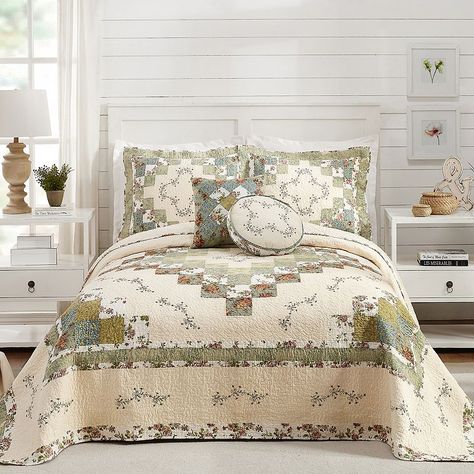 Redefine the look of your bedroom, thanks to Modern Heirloom. Redefine the look of your bedroom, thanks to Modern Heirloom. The Olivia Sham is in a delightful, classic square pieced pattern. Romantic florals, in shades of green, are accented with a pretty, floral vine embroidery motif to create a timeless look. The traditional vermicelli quilting pattern is the perfect finishing touch.SIZING Standard sham: 20'' x 26" King sham: 20'' x 36" Queen bedspread: 102" x 118'' King bedspread: 120'' x 118 Patchwork, Round Decorative Pillows, Vine Embroidery, Patchwork Bedspread, Romantic Florals, Embroidery Motif, Queen Bedspread, King Quilt Sets, Top Of Bed