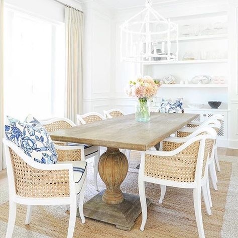 I need this dining room! I love Monika Hibbs and all of her home decor. The layered rug look is so great for a larger space, especially with a jute rug tying in the neutral and nautical accents. Layered Jute Rug, Nautical Dining Room, Coastal Farmhouse Dining Room, Lake House Dining Room, Blue And White Dining Room, Beach House Dining Room, Beach Dining Room, Coastal Rug, Monika Hibbs