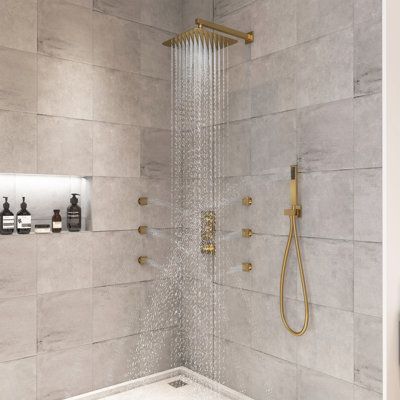 Get ready for ultimate relaxation getting a relax bathing with casainc 12 inch square shower head. Moreover the french vernet thermostatic valve can balances constant temperature for avoiding scald. Don't hesitate, get yours today and start enjoying CASAINC quality at home! Finish: Brushed Gold | CASAINC 3 Functions 12 Inch Wall Mount Thermostatic Shower System w / 6 Body Jets in Yellow | 11.8 W in | Wayfair CA-102009LK-2 Dual Shower Heads Master Baths, Double Shower Head Master Baths, Gold Shower Fixtures, Double Shower Heads, Multiple Shower Heads, Square Shower Head, Wall Panels Bedroom, Marble Showers, Gold Shower