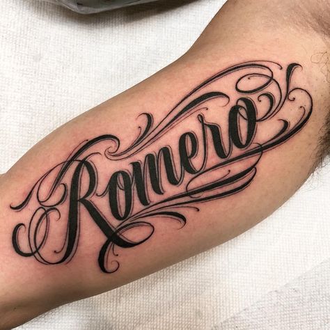Romero on my Dawg @yousef_e for appts 📧Saullira@yahoo.com #saullira Tatoo Fonts, Last Name Tattoos, Forearm Name Tattoos, Tattoo Writing Styles, Tattoo Name Fonts, Tattoo Letras, Tattoo Font For Men, Tattoo Fonts Cursive, Names Tattoos For Men