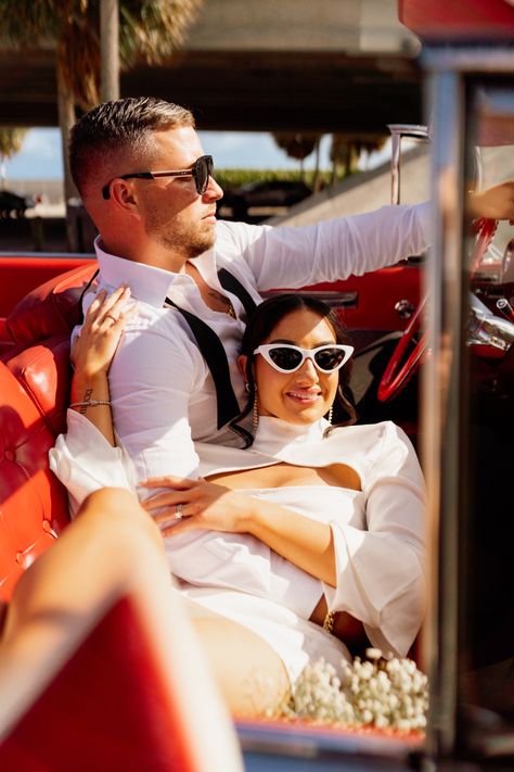 Red Car Engagement Photos, Couple Photoshoot With Vintage Car, Lowrider Couple Photoshoot, Vintage Engagement Photos Car, Engagement Photoshoot Vintage Car, Low Rider Engagement Photos, Pre Wedding Car Photoshoot, Muscle Car Engagement Photos, Sports Car Engagement Photos