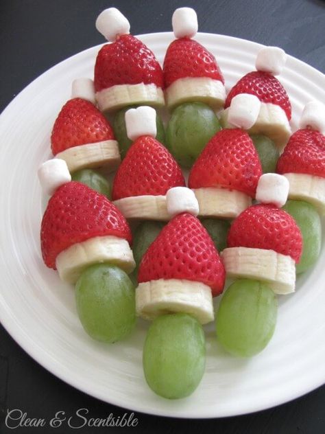 12 Healthy Holiday Treats for Kids | Holley Grainger Grinch Fruit Kabobs, Healthy Christmas Snacks, Jul Mad, Healthy Christmas Recipes, Decorações Com Comidas, Fruit Kabobs, Healthy Christmas, Holiday Snacks, حلويات صحية