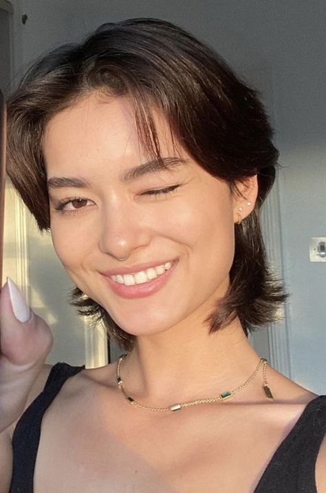 Short Hair Longer In Back, Layered Short Brunette Hair, Above Shoulder Wolfcut, Short But Feminine Hair, Shaggy Long Pixie Haircut, Short Hair Small Forehead, Short Haircut For Women Round Face, Short Haircuts For Rectangular Faces, Modern Mullet Women Straight Hair