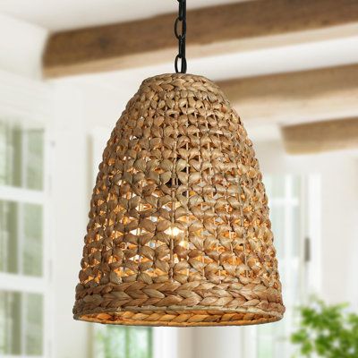 With a natural woven rattan design and hand-woven value, this rattan pendant lighting seamlessly combines farmhouse touch with a modern simplicity, delivering an airy and free sense. With meticulous handcraft, every strand in brown is intricately woven to form a simple bell shape, bringing a touch of rustic charm and warmth to your indoor space. Diffused from a bulb(not included/up to 60W), the warming lighting goes through the gaps of each rattan and the shadows play with the lighting, lit up an instant romantic ambiance. Suspend alone or a row in your kitchen island, dining room, entryway, hallway or the outdoor area, this rattan pendant expresses a nature and freedom to life and space. | Bay Isle Home™ Irja 1 - Light Brown Pendant, Rattan in Black / Brown | 17.3 H x 12.6 W x 12.6 D in | Wicker Pendant Light Kitchen Island, Black Pendant Lights Over Island, Rattan Pendant Light Kitchen, Rattan Pendant Lighting, Basket Pendant Light, Rattan Kitchen, Rattan Lighting, Woven Pendant Light, Lights Over Island