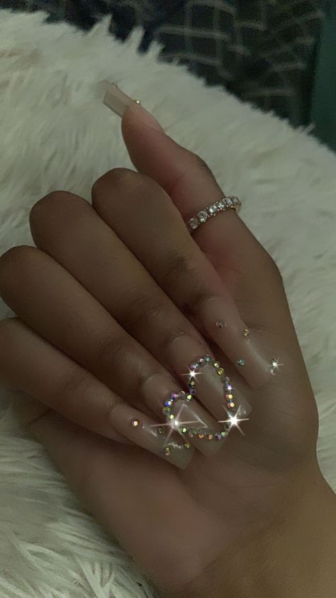 nails nailinspiration valentinenails heart Heart Nails Design With Rhinestones, Heart Designed Nails, Nail Designs With Gems Simple, Simple Nail Ideas With Rhinestones, Simple Bling Nails Rhinestones, Nail Idea With Gems, Rhinestone Nails Aesthetic, Acrylic Nails Heart Gems, Cute Nail Designs With Hearts