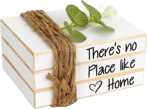 PRICES MAY VARY. Farmhouse Home Decor - Our Noble Nest farmhouse inspired book decor is perfect for adding a cozy feel and bringing rustic charm to your home. Our decorative books feature black printed warm sentiment that reads "There's no place like home" on the spine, PVC green leaves on top and tied with jute sting for decoration. It is a great addition to your rustic home decor, shabby chic, vintage, cottage, or French country decor. Coastal Decor - Incorporate a bit of a coastal cottage cha Farmhouse Coffee Table Decor, Books For Decoration, Coffee Table Books Decor, Tiered Tray Decor Farmhouse, Faux Books, Books Decor, Decor Coffee Table, Farmhouse Table Decor, Book Stacks