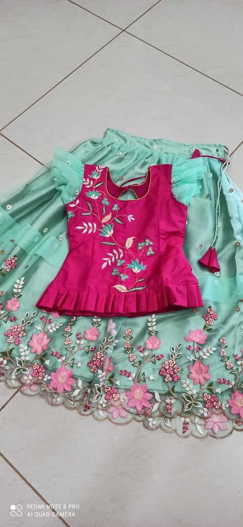 Net lehanga @srija's Kids Blouse Designs Baby Girls, Net Frocks For Kids, Kids Lehenga Blouse Designs, Kids Blouse Designs For Lehanga, Langa Blouse For Kids, Long Frocks For Kids, Indian Dresses For Kids, Baby Dress Embroidery, Cotton Frocks For Kids