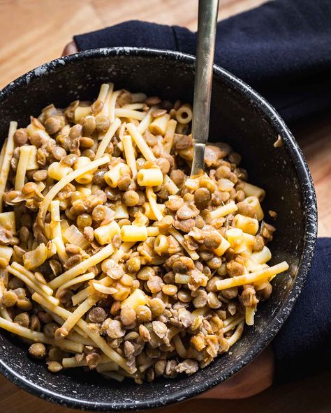 Pasta e lenticchie, or pasta with lentils, is the perfect meal to make when you don't have time for a grocery run but still want something GOOD. This is the perfect excuse to use up any leftover mismatched pasta lying around in your pantry. Toss together with lentils, onions, garlic, and a touch of tomato paste, and top with plenty of parmesan and good extra virgin olive oil for the perfect easy weeknight dinner. #pasta #pastaelenticchie #lentils #lentilrecipes #italianfood Pasta With Lentils, Pantry Pasta, Pasta Con Broccoli, Sip And Feast, Fennel And Orange Salad, Dinner Pasta, Orecchiette Pasta, Italian Comfort Food, Lentil Pasta