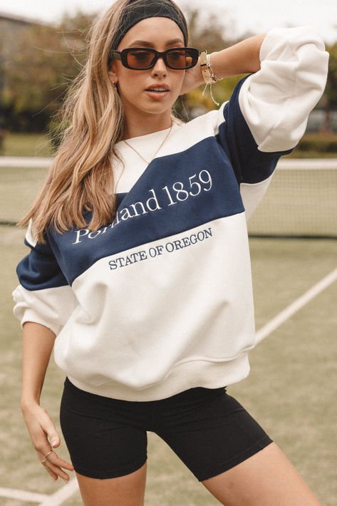 DETAILS   When it comes to comfortable and cosy outfits, the Portland Colorblocke Oversized Sweatshirt is definitely a must-have. This sweatshirt features a pullover style sweater with crewneck neckline and ribbed hemline. The soft fleece fabric, and the graphic text feature adds a touch of personality to this otherwise classic set.    pull on style sweatshirt   crewneckline  long sleeves with ribbed cuff   ribbed hem  soft fleece fee    relaxed fit  graphic text feature  unlined   material - 68% polyester / 32% cotton    SIZING     model is 5' 7" and wears a Size S    model stats: bust - 33", waist - 27", hips - 36"         GARMENT CARE    cold hand wash separately Cosy Outfits, Cosy Outfit, Slogan Sweatshirt, Shirt Outfit Women, Sweat Hoodie, Sweatshirt Outfit, Style Sweater, Clothing Details, Womens Workout Outfits