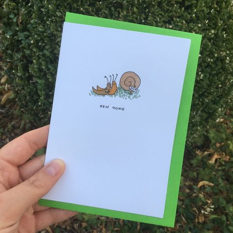 Happy snails find a new home - these critters have just moved house and are celebrating! A cute little card to send to a loved one who is moving into their new home. Whether it is their first home or they are moving house, this card is a cute way to let them know you are thinking of them. Each design is hand drawn and painted with watercolour. Each card is printed to order and the envelope colour will be chosen at random from a rainbow selection! New Home Greeting Card, House Warming Card, Moving Card, New Home Greetings, Housewarming Card, Moving Cards, New Home Cards, Moving House, First Home