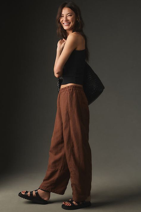 Tencel, linen Front slant pockets Back patch pockets Pull-on styling Machine wash Imported | Linen-Blend Barrel Pull-On Pants by Pilcro in Brown, Women's, Size: Medium, Linen/Tencel at Anthropologie Brown Linen Pants Outfit, Linen Pants Outfit Summer, Barrel Pants, Brown Linen Pants, Linen Pants Outfit, Summer Pants Outfits, Fitted Jeans, Minimal Wardrobe, Athleisure Trend