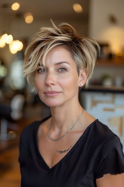 The Best Pixie Haircut Ideas of 2024 Choppy Asymmetrical Haircut, Pixie Hair Blonde Highlights, Pixie 50 Older Women, Pixie Cut Blonde Highlights, Short Hairstyles Over 40 Women, Short Hairstyle Women For Older Women, Very Short Hair Highlights, Juliana Hough Short Hair, Blonde Highlights For Older Women