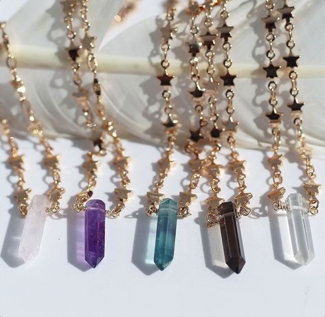 We’ve been over here working on our newest collection which is almost officially complete, but here to say that starry chokers in all the crystals are finally here for you! Pick your crystal and pick gold or silver star chain, so many cute options for these little babies. Side note- everyone has been going crazy for rainbow fluorite lately and our mini points are sold out for the next day or so, but we have new big batch of stones in the works right now so it’s just temporary. I’ll be sure to... Star Choker, Crystal Point Necklace, Crystal Amethyst, Necklace Star, Crystals Jewelry, Crystal Pendants, Layered Chokers, Star Chain, Tiny Star