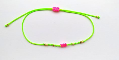 Beautiful, delicate bracelet made of neon green and neon pink string and gold beads, handmade with very good energy. Perfect for a gift for various occasions, as well as for yourself. Neon Bracelets, Beads Handmade, Handmade Gold, Good Energy, Neon Green, Gold Beads, Neon Pink, Delicate Bracelet, Bracelet Making