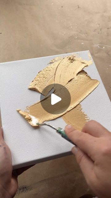 Nada Khatib | Fine Art. on Instagram: "A simple and effective technique to create a beautiful textured background - I am using Expression By Nada palette knife #2 then a sparse wispy brush to achieve this effect.  I have exciting plans for these paintings - stay tuned for part 3!🌹♥️✨  #texturetechniques #texturepainting #textureart #textureartist #paletteknife #paletteknifepainting #iridescentart #goldpaint #goldpainting #rosegoldpaint #rosegoldart #metallicpaint #metallicpaints #metallicpainting #satisfyingpaint #texturetuesday #texturedart #texturedpainting" Simple Texture Background, Gold Painted Walls, Texture Painting Techniques, Cuadros Diy, Rose Gold Painting, Gold Abstract Painting, Gold Art Painting, Abstract Art Painting Techniques, Palette Knife Art