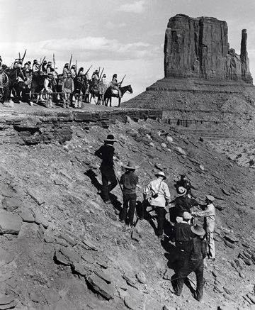 On location in Monument Valley, making "Stagecoach" in 1938. From UA/The Kobal Collection. Ranch Wife, John Carradine, John Wayne Movies, Into The West, Historical Movies, Film Maker, John Ford, Western Film, Wow Video