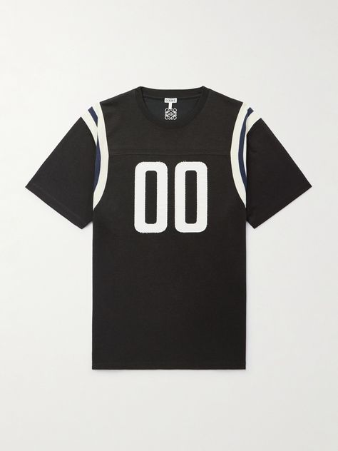 A '00' hasn't been sported on an NFL uniform since the '70s, but Loewe makes an exception with this T-shirt. Riffing on American football jerseys, it's made from cotton-blend jersey with an appliquéd front and embroidered 'Anagram' at the nape. Nfl Uniforms, American Football Shirt, Tom Ford Bag, Nfl Jersey, Wardrobe Edit, Loungewear Shorts, Luxury Sneakers, Classic Sneakers, Football Jerseys