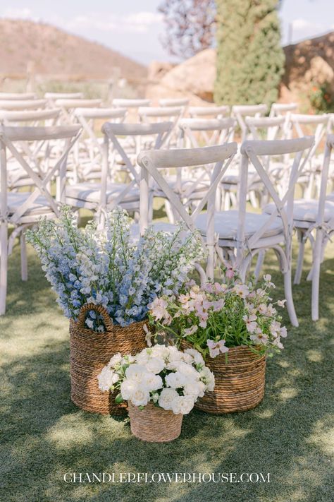 Flower Basket Wedding Aisle, Basket Florals Wedding, Basket Floral Arrangements Wedding, Wedding Blue Florals, Baskets With Flowers Wedding, Basket Of Flowers Wedding, Wicker Basket With Flowers, Outdoor Blue Wedding, Wedding Basket Flowers