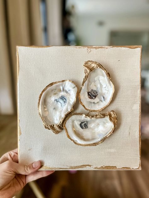 Want to know how to turn an oyster shell into wall decor? Read on to learn how to create DIY oyster shell art in just 5 simple steps! Cleaning Oyster Shells, Pineapple Oyster Shells Diy, Oyster Wall Art, How To Drill Holes In Shells, Shell Diy Ideas, Diy Seashell Decor, Oyster Shell Decor, Decoupage Oyster Shells Diy, Diy Oyster Shell Crafts