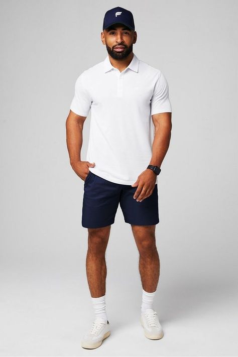 Opt for golf shorts with a tailored fit and multiple pockets for both style and practicality on the course. Men Over 30 Fashion, Stylish Dads Mens Fashion, Mexico, Mens Polo And Shorts Outfit, Mens New Orleans Outfit, Short Mens Fashion Casual, Mens Las Vegas Outfit Ideas Summer, Golf Outfit Men Aesthetic, Golf Outfits Man