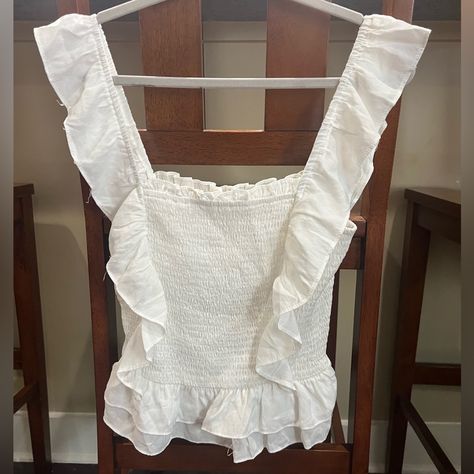 Boutique Bought White Sleeveless Ruffle Top. Great For The Summer. Never Worn Before White Frilly Top, Sleeveless Ruffle Top, Fashion Airport, Frilly Top, White Ruffle Top, Crop Top White, Ruffle Crop Top, White Sleeveless, White Crop Top
