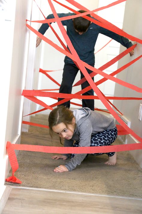 Make a hallway laser maze! Easy, inexpensive indoor activity for kids that's super fun! Perfect for kids who love playing superhero or spy - and fun for birthday parties, too. Super Hero Activities, Superhero Party Games, Princess Party Games, Energy Kids, Fun Indoor Activities, Outdoor Birthday, Birthday Activities, Indoor Fun, Indoor Activities For Kids