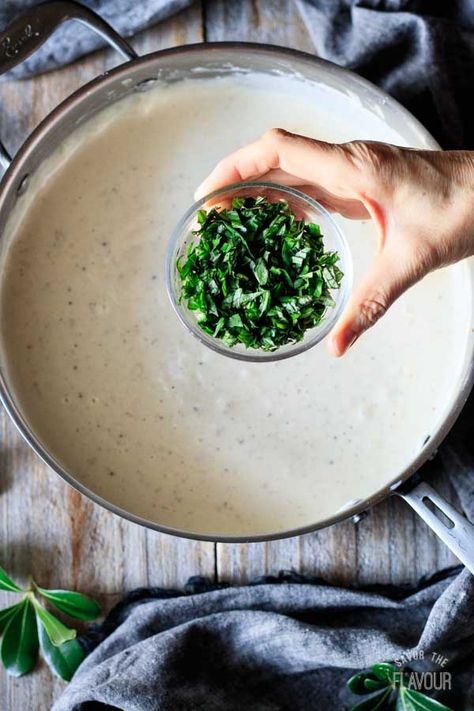 Alfredo basil sauce is an easy recipe that is creamy, cheesy, and so simple to learn how to make. With the help of some garlic, Parmesan, heavy cream, and fresh basil, you'll have a restaurant quality sauce that tastes amazing on fettuccine or tortellini. | www.savortheflavour.com #savortheflavour #alfredosauce #pastasauce Basil Alfredo Sauce, Fettuccine Sauce, Basil Sauce Recipe, Fresh Basil Recipes, Roasted Grape Tomatoes, Alfredo Sauce Recipe Easy, Zesty Salad, Cooking With White Wine, Creamy Pasta Dishes