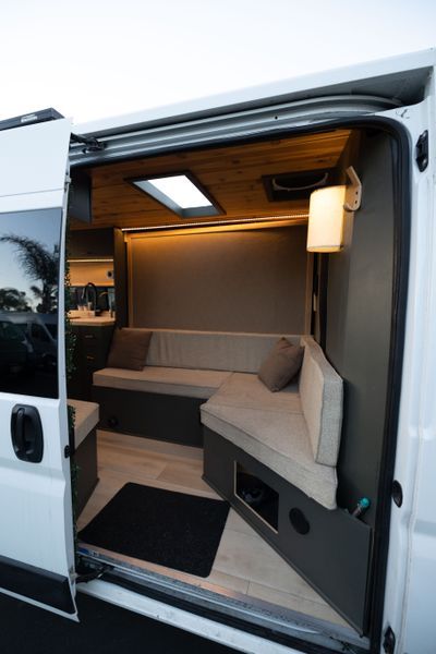 Camper Van For Sale: "Jazz" 2019 ProMaster Luxury Lounge on Wheels Ram Promaster Conversion, Van Cabinets, Sleeper Van, Campervan Design, Van Remodel, Camper Van Interior, Van Interiors, Custom Rv, Rv Van