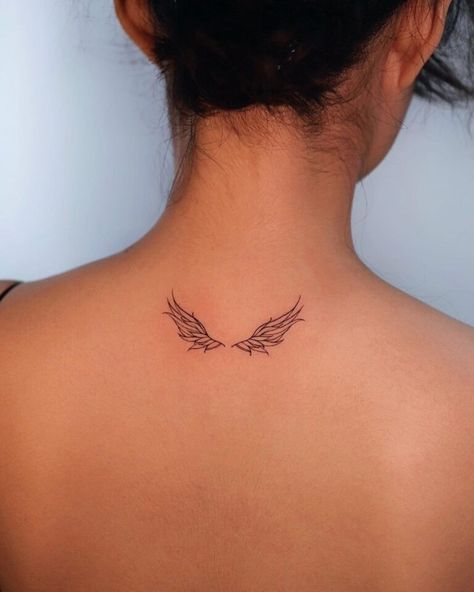 Best 70+ Wing Tattoo Designs Ideas - May 2024 Wing Tattoo Placement Ideas, Behind Ear Tattoo Angel Wing, Angel Wings Simple Tattoo, Wings Back Tattoo Men, Wing Tattoo Back Of Neck, Angle Wing Tattoos For Women, Wing Tattoo Designs For Women, Butterfly Wings On Back Tattoo, Angel Wing Tattoo Small