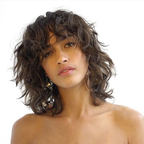 Hair, Hairstyle, Chin, Eyebrow, Layered hair, Brown hair, Human, Wig, Lip, Black hair, Curly Shag Haircut, Wavy Bangs, Short Wavy Haircuts, Short Shaggy Haircuts, Short Shag Haircuts, Thick Wavy Hair, Wavy Haircuts, Short Curly Haircuts, Haircuts For Wavy Hair