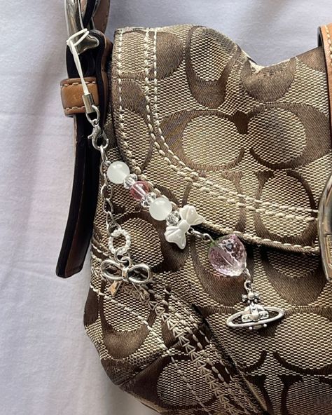 details ✨ ISO some cute bag charms 🍒 . . . . . #depop #y2k #2000s #designerheels #vintagedesignerheels #prada #coach #manoloblahnik #depopseller #fashioninspo #summer #reseller #thriftstore #vintagestore #fashion #thrifthaul #thrift #haul #gucci #oldmoney #coach #vintagecoach #vintagedesignerbag #designerbag #dior Coach Y2k Bag, Coach Bags Vintage, Cute Bag Charms, Coach Vintage Bag, Depop Y2k, Emo Girl Outfit, Vintage Prada Bag, Y2k Bag, Gucci Vintage Bag