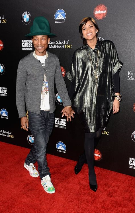 Pharrell Williams and Helen Lasichanh Pictures Celebrities, Helen Lasichanh, Fun Couple, Pharrell Williams, Cute Photos, The Knot, Academic Dress, Knot, Bomber Jacket